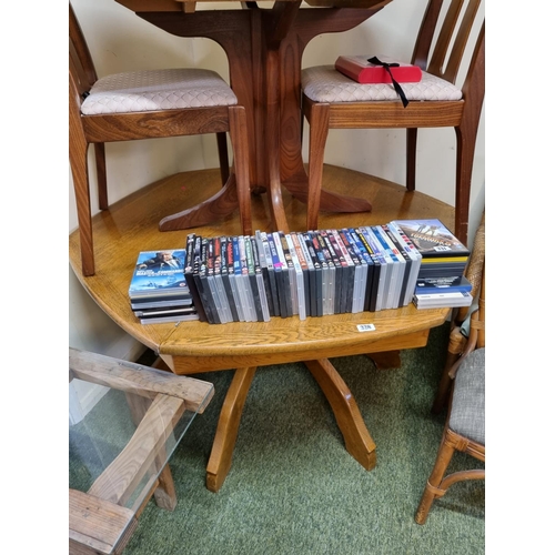 328 - Large Oak Hexagonal table on cruciform supported base