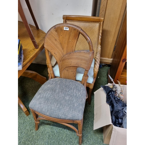 329 - 2 Cane Conservatory chairs with upholstered seats