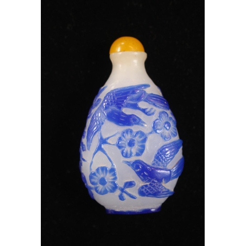 207 - Chinese Blue Overlay white glass Snuff bottle with yellow top