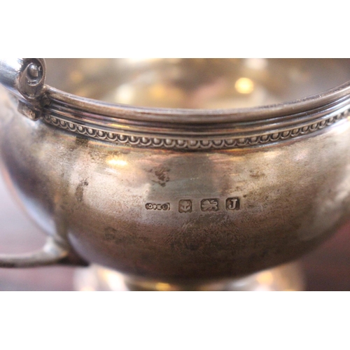 225 - Early 20thC Silver Cream jug and sugar bowl Birmingham 1933 244g total weight and a Silver Dressing ... 