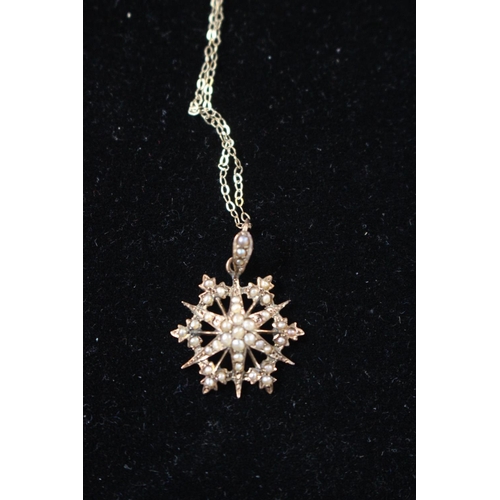 230 - Edwardian 9ct Gold Seed pearl set star design pendant on 9ct gold chain 2g total weight