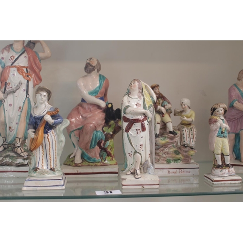 31 - Collection of 8 Late 18thC Pearlware figures inc Rural Pastime, Classical figures etc