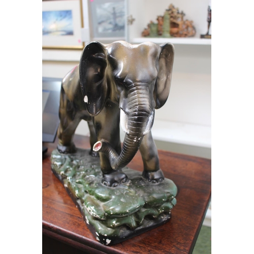 7 - Large 1930s Plaster Figure of an Elephant on naturalistic base. 37cm In Height