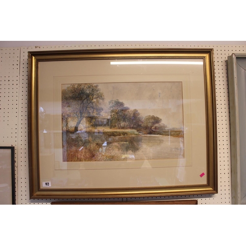 92 - Large Edwardian gilt framed watercolour of a river scene signed to bottom left