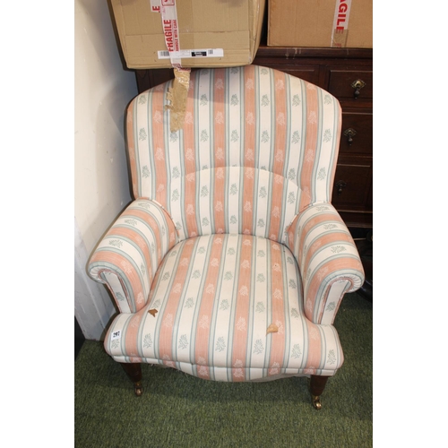 383 - Modern Elbow chair on turned legs with brass casters