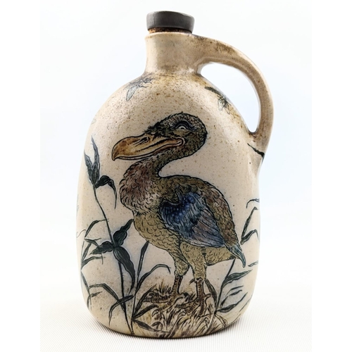 11 - A Martin Brothers Stoneware Dodo ewer, dated 1896, shouldered, oval bodied hoop handle modelled with... 