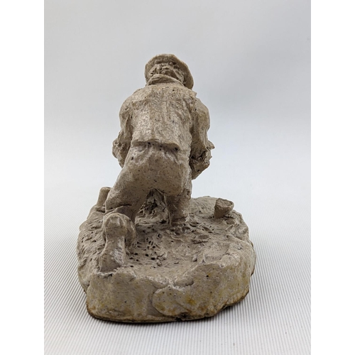 12 - Rare Martin Brothers figure of The Gardener by Robert Wallace Martin. Depicting a man kneeling plant... 