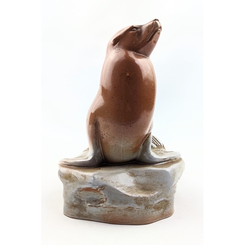 5 - A Wedgwood Norman Wilson glazed seal, circa 1959, designed and signed by John Skeaping, stamped Wedg... 