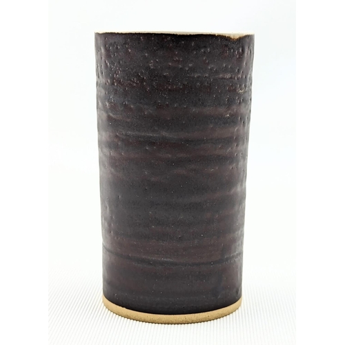 7 - Dame Lucie Rie D.B.E (1902-1995) a stoneware cylindrical vase, the exterior bronze the interior off ... 