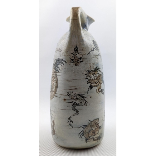 9 - A Martin Brothers Stoneware Aquatic ewer, dated 1896, shouldered, oval bodied graduated handle model... 