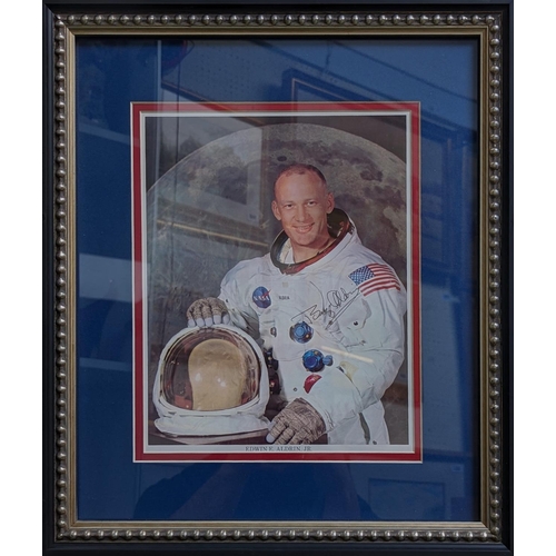 66 - Edwin E. Aldrin signed framed photo. COA to reverse PSA AE75136. 35 x 44cm total size