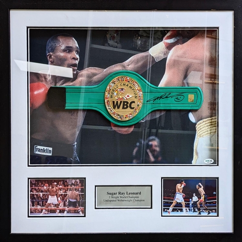 73 - An Official WBC mini belt framed and signed by Sugar Ray Leonard former welterweight and middleweigh... 