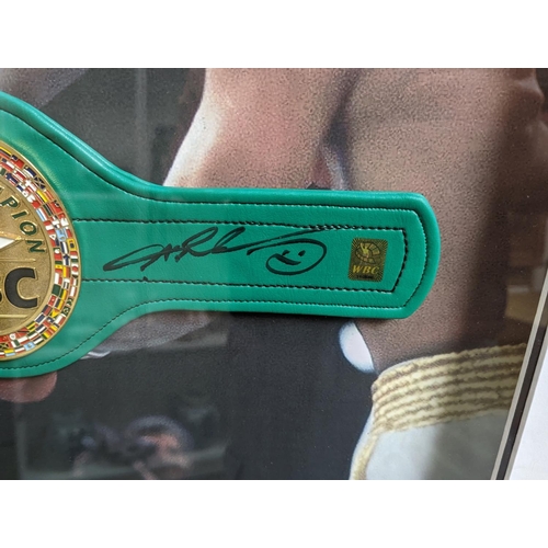 73 - An Official WBC mini belt framed and signed by Sugar Ray Leonard former welterweight and middleweigh... 