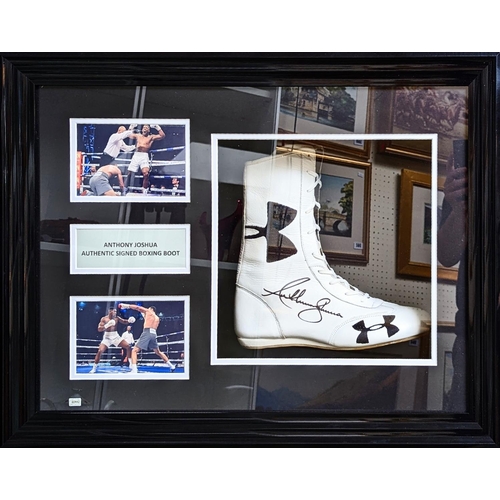 78 - A framed and signed replica boxing boot signed by Anthony Joshua. Please note: this is a replica boo... 