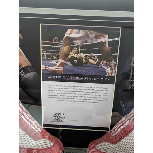 86 - Authentic and original fight worn boxing boots signed and worn by Manny Pacquiao in his fight agains... 