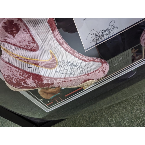 87 - Authentic Manny Pacquiao signed and worn first ever Nike boots he was given for his sponsorship deal... 