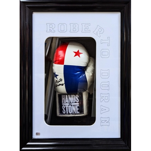 99 - Roberto Duran 'Hands of Stone' Signed Boxing Glove. COA to reverse 5th King Memorabilia. 44 x 58cm t... 