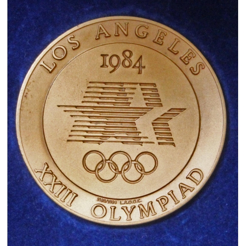 38 - Scarce 1984 Los Angeles Olympic Games participants large embossed medal in original case.