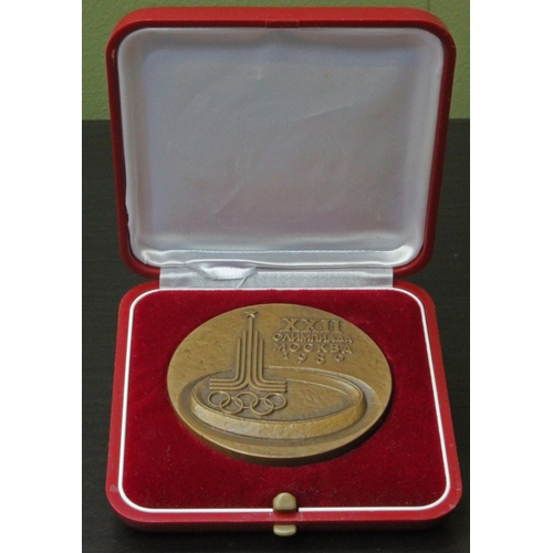 39 - Scarce 1980 Moscow Olympic Games participants large embossed medal in original case.