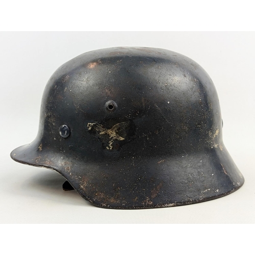 180 - WW2 German Luftwaffe M42 Helmet & Liner marked 55 to interior - rubbing to Decals