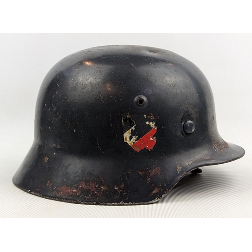 180 - WW2 German Luftwaffe M42 Helmet & Liner marked 55 to interior - rubbing to Decals