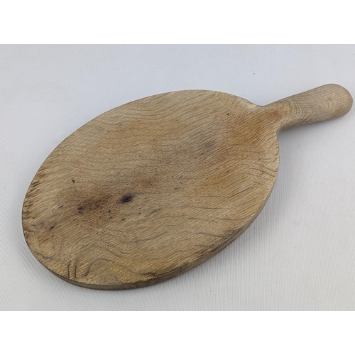 201 - A Robert ''Mouseman'' Thompson Oak Chopping Board, with carved mouse signature, 37cm in Length