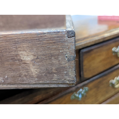 212 - Georgian Oak chest of drawers 2 over 3 on bracket feet with brass drop handles. 81cm wide by 48cm de... 