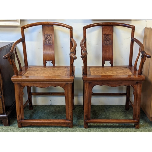 213 - Pair of late 19th/ early 20th century Chinese Huanghuali continuous yoke back armchairs (scholars/Of... 