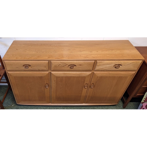 214 - Ercol sideboard of 3 drawers and cupboards, 94cm high x 155cm wide x 43 depth