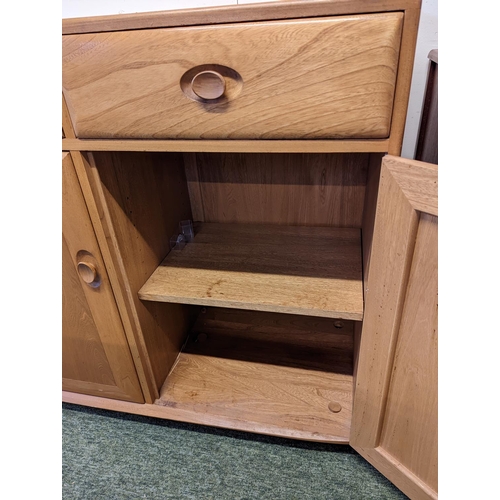 214 - Ercol sideboard of 3 drawers and cupboards, 94cm high x 155cm wide x 43 depth