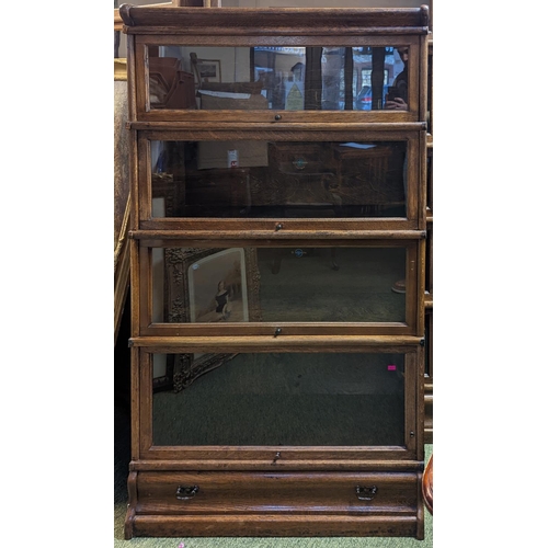 218 - The Globe Wernicke Co Limited of London 4 Stack Oak Barristers bookcase with coppered fittings, draw... 