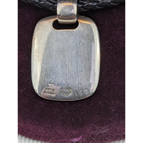 246 - Georg Jensen Silver Pendant on Leather braided necklace in the style of Mobius, stamped marks 47cm i... 