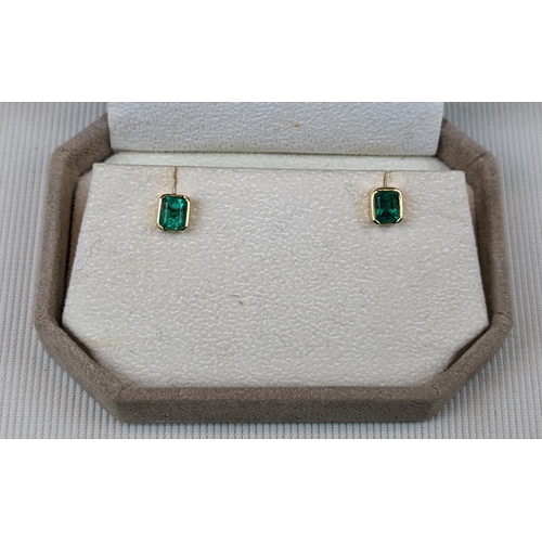 255 - Pair of 18ct Columbian Emerald facet Cut earrings with half bezel setting 1.50ct total with Certifie... 