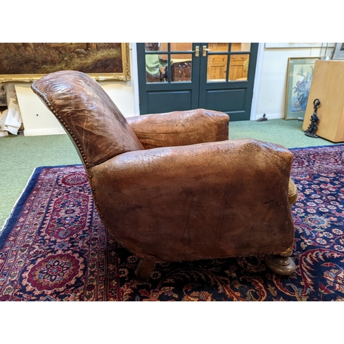 227 - Late Victorian, French leather club chair on bun feet with original velour seat and nice patina and ... 