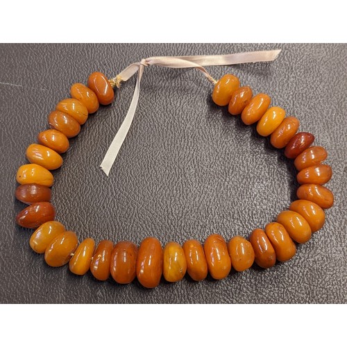 262 - Large, beaded butterscotch Baltic amber necklace 107g total weight.