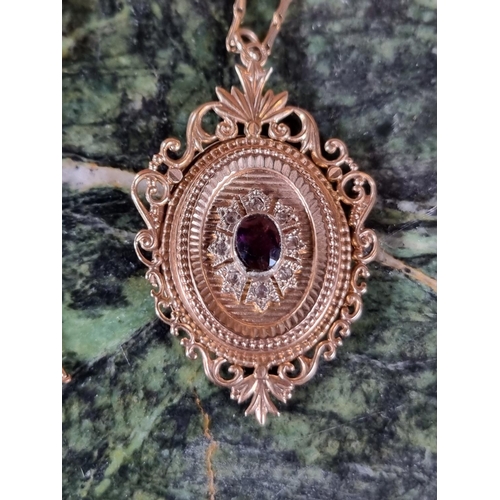 240h - 20thC 9ct Gold Almaldine garnet set Pendant with hinged back and Long link chain 9.8g total weight