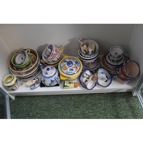 106 - Large collection of French Quimper Pottery to include bowls, Teapot etc