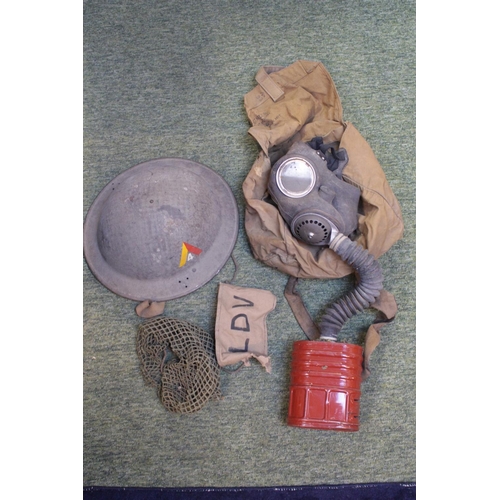 279 - WW2 Home Guard Helmet, Gas mask with armband etc