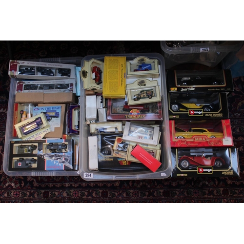 284 - 2 Boxes of Burago and other boxed vehicles