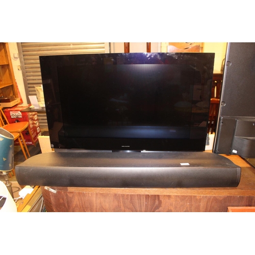 548 - Bang and Olufsen TV with remote and sound bar