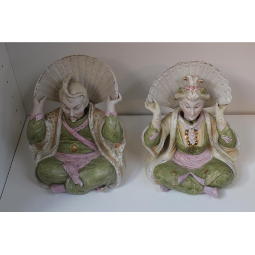 64 - Pair of 19thC German Chinoiserie decorated nodding figures in the style of Meissen. 18cm in Height