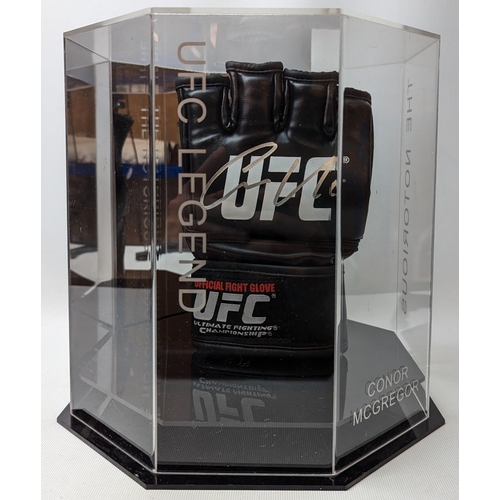 111 - Conor McGregor UFC signed glove in case UFC Legend