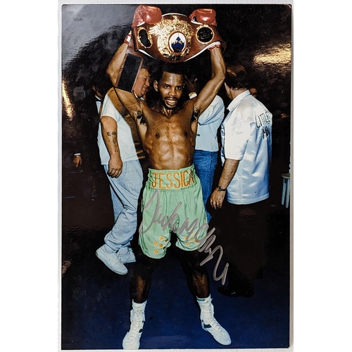 148 - Coloured Photograph signed by boxer 