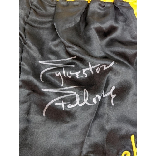 28 - Black & Yellow, Sylvester Stallone Signed Boxing shorts, 