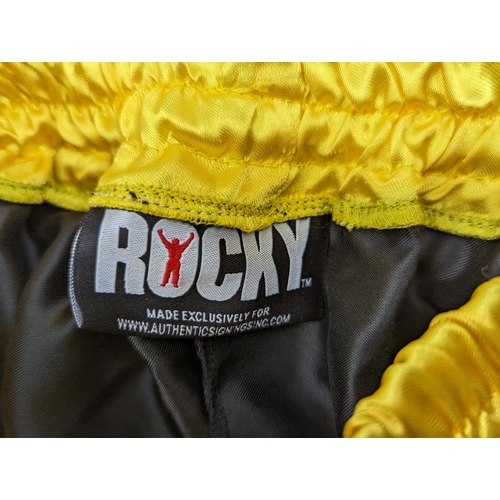 28 - Black & Yellow, Sylvester Stallone Signed Boxing shorts, 