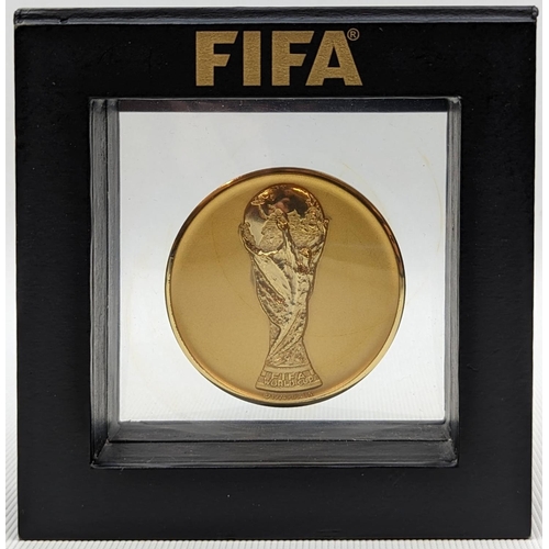 64 - Gold Tone participants medal presented during the 2010 FIFA World Cup in South Africa. The obverse o... 