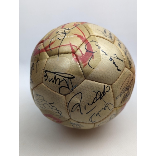 86 - 2002 FIFA World Cup gold ball signed by all the Brazilian Players, 30/6/02