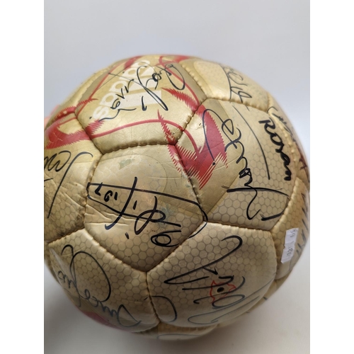 86 - 2002 FIFA World Cup gold ball signed by all the Brazilian Players, 30/6/02