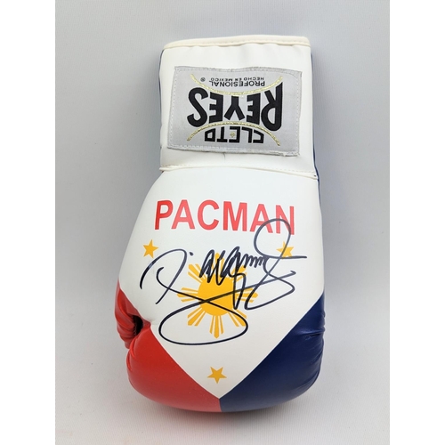 89 - Cleto Reyes signed boxing glove by Manny Pacquiao 