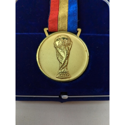 205 - 2002 World Cup winner's gold medal FIFA WORLD CUP, obverse with the Jules Rimet trophy in relief, in... 